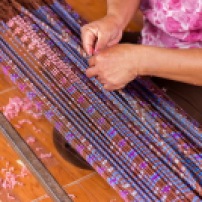 Patterning before weaving